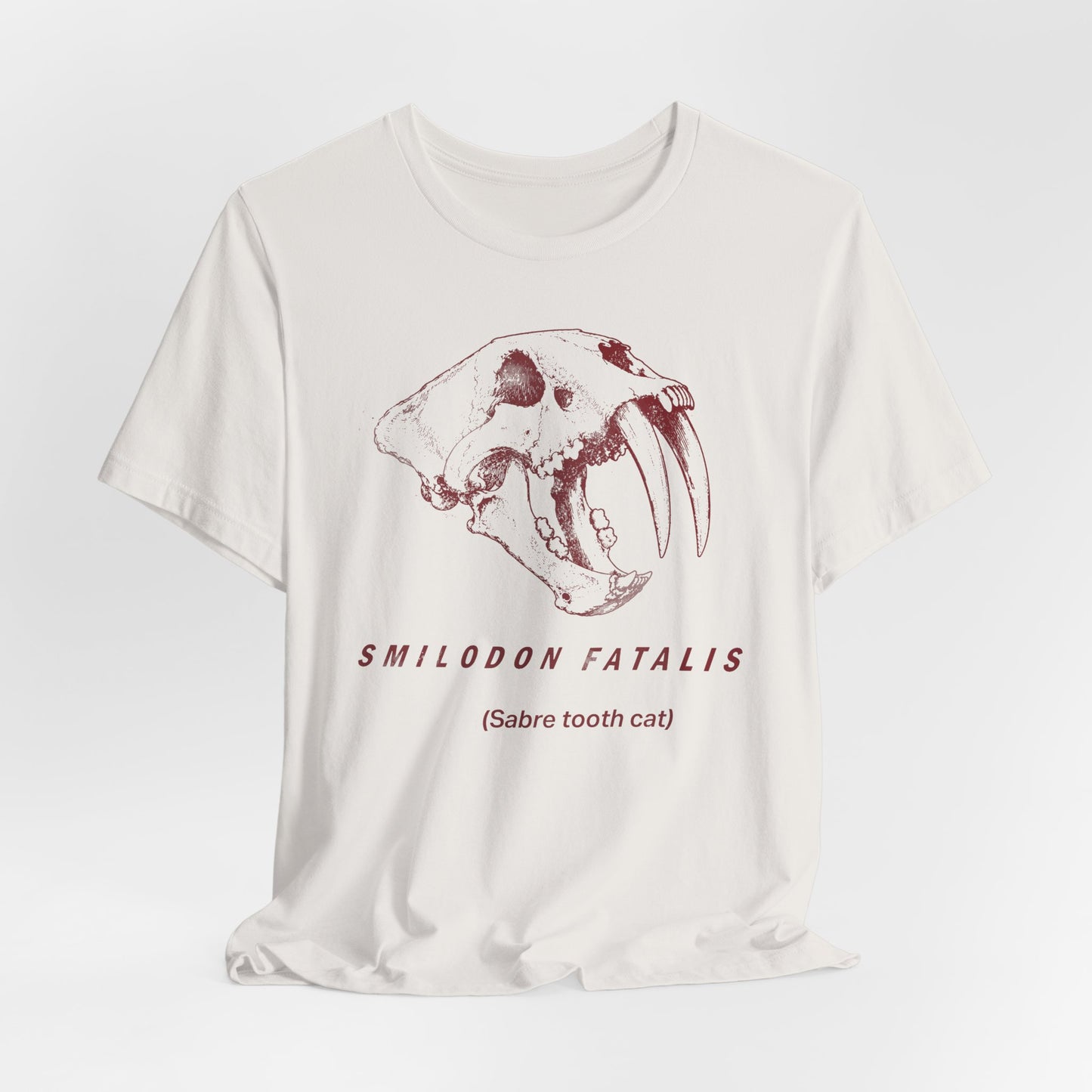 Smilodon Skull Tee – Vintage Sabertooth Fossil Graphic T-Shirt
